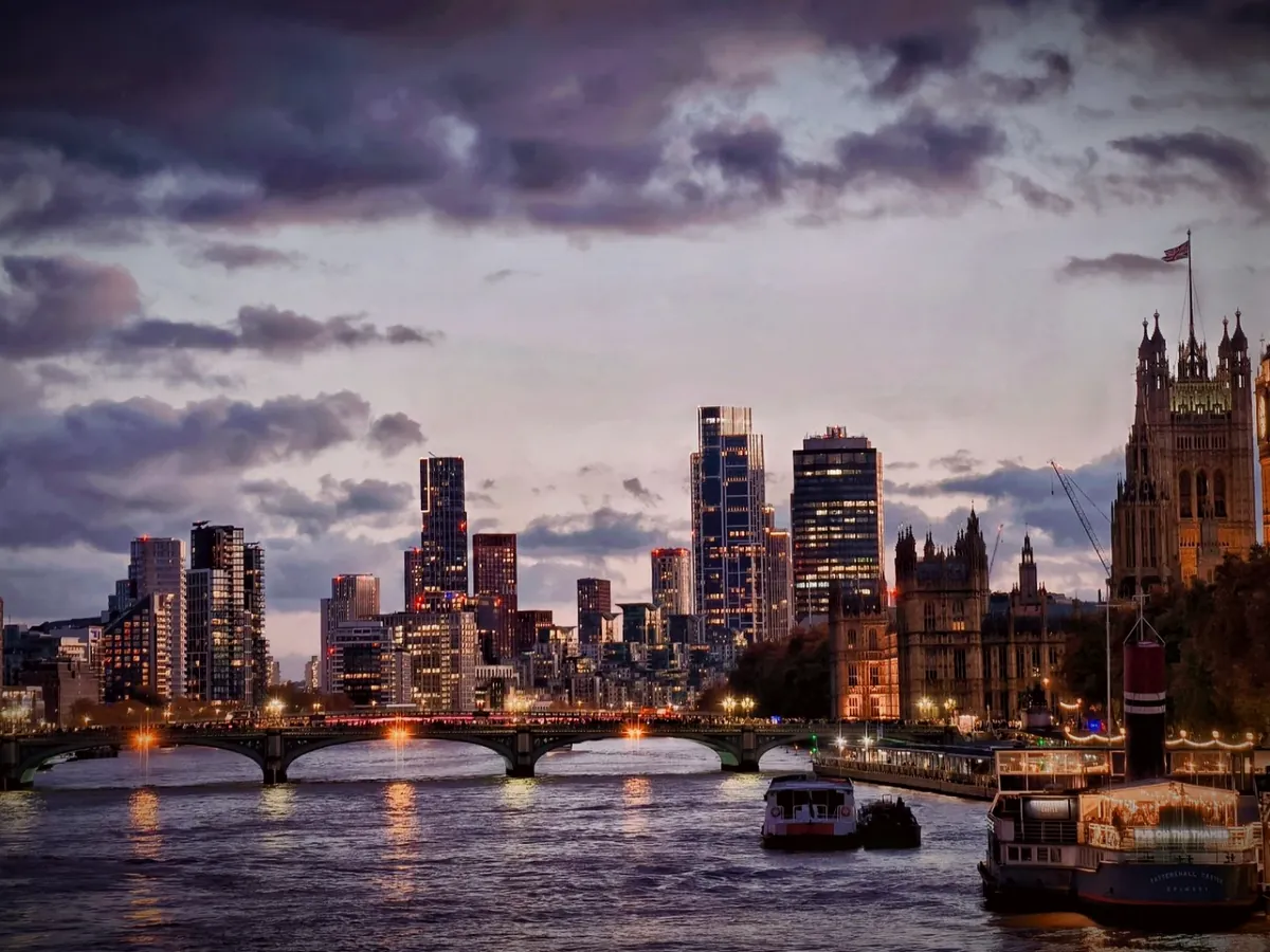 London skyline at dusk across the Thames